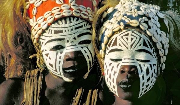 two girls with typical face painting at a Vodun feast, Cote d'Ivoire