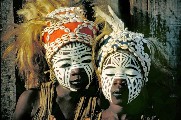 EBRD1T two girls with typical face painting at a Vodun feast, Cote d'Ivoire